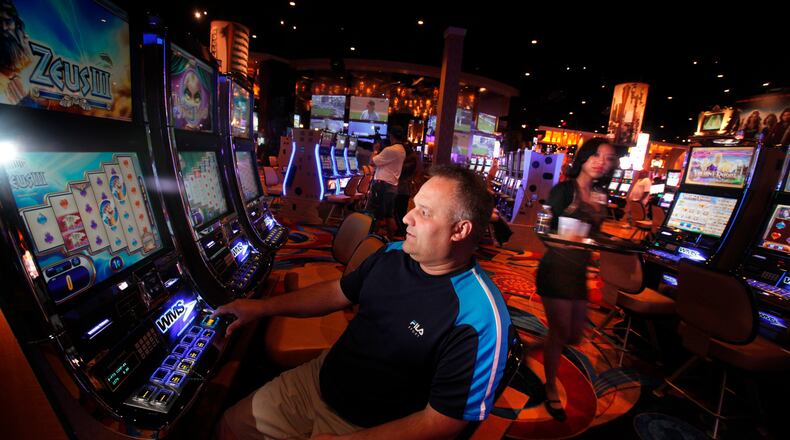 James Cairl from Toledo tries his luck on the floor of the Hollywood Casino in Columbus in a 2015 photo. (Dispatch photo by Tom Dodge)