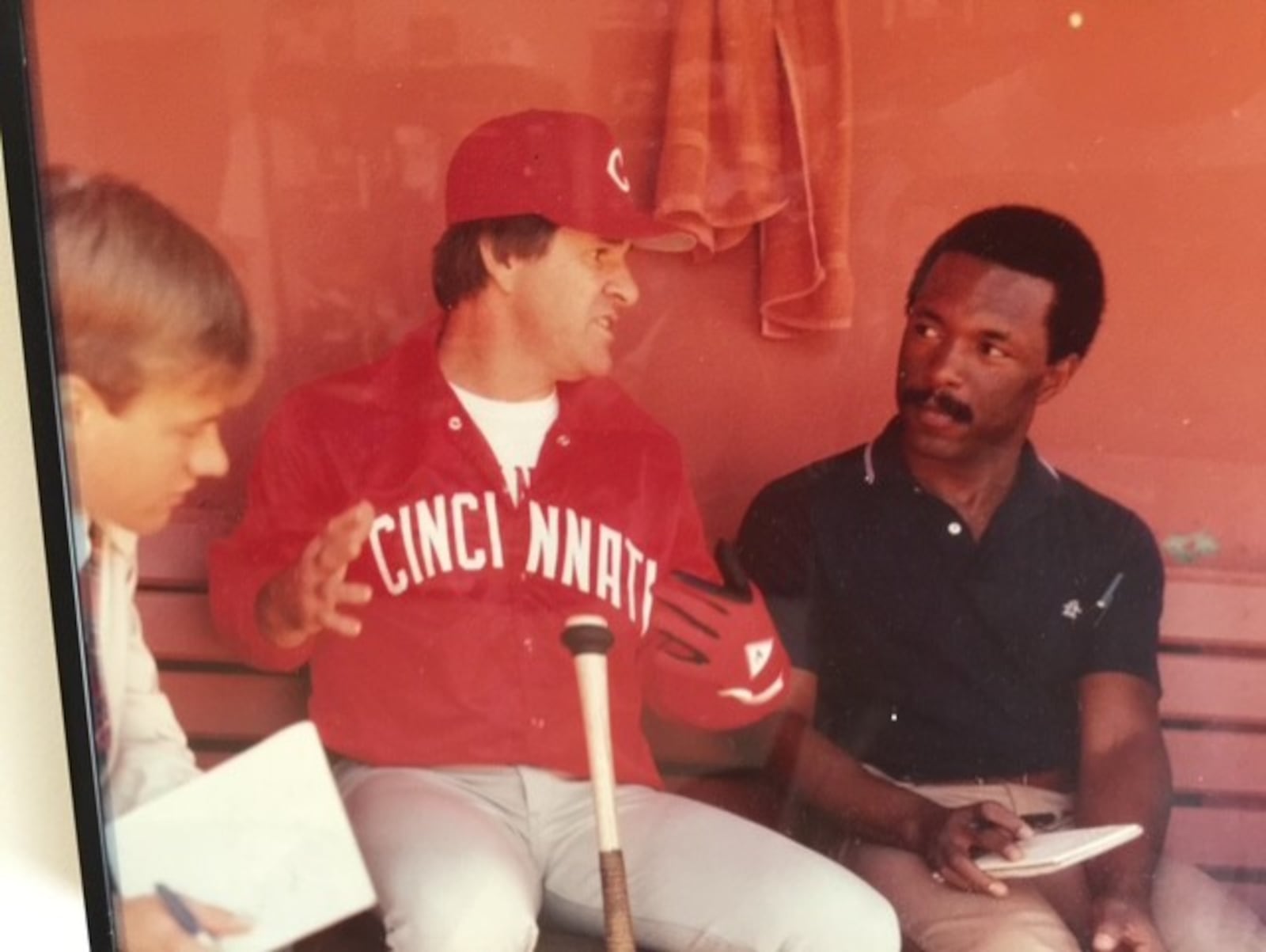 Terence Moore, then a sports writer for the San Francisco Examiner, interviews Pete Rose in the visiting dugout in the fall of 1984 at Candlestick Park in San Francisco. CONTRIBUTED PHOTO
