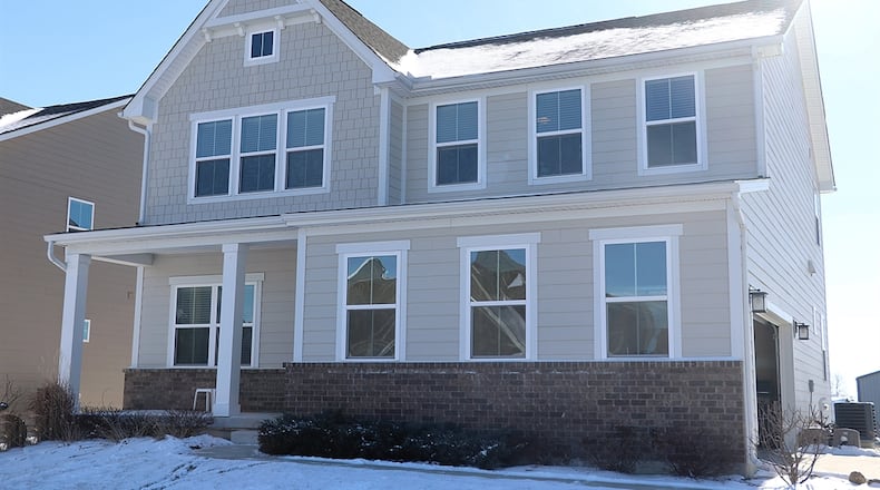 Listed for $479,900, the brick-and-vinyl, two-story home in Troy offers about 3,698 square feet of living space. CONTRIBUTED BY KATHY TYLER