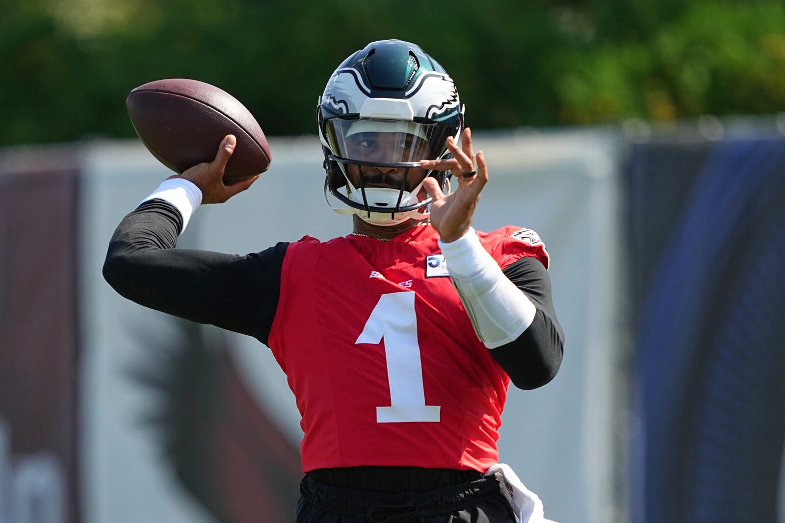 Philadelphia Eagles quarterback Jalen Hurts throws a pass during an NFL football training camp, Wednesday, July 23, 2025, in Philadelphia. (AP Photo/Matt Rourke)
