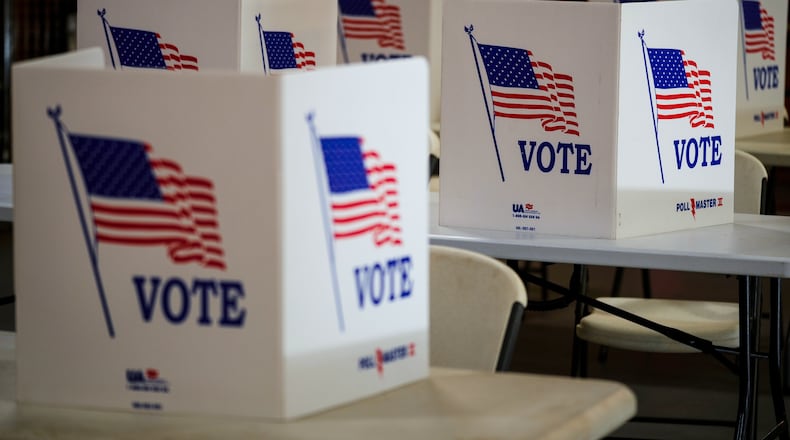 FILE- Voting booths are set up at a polling place in Newtown, Pa, April 23, 2024. (AP Photo/Matt Rourke, File)