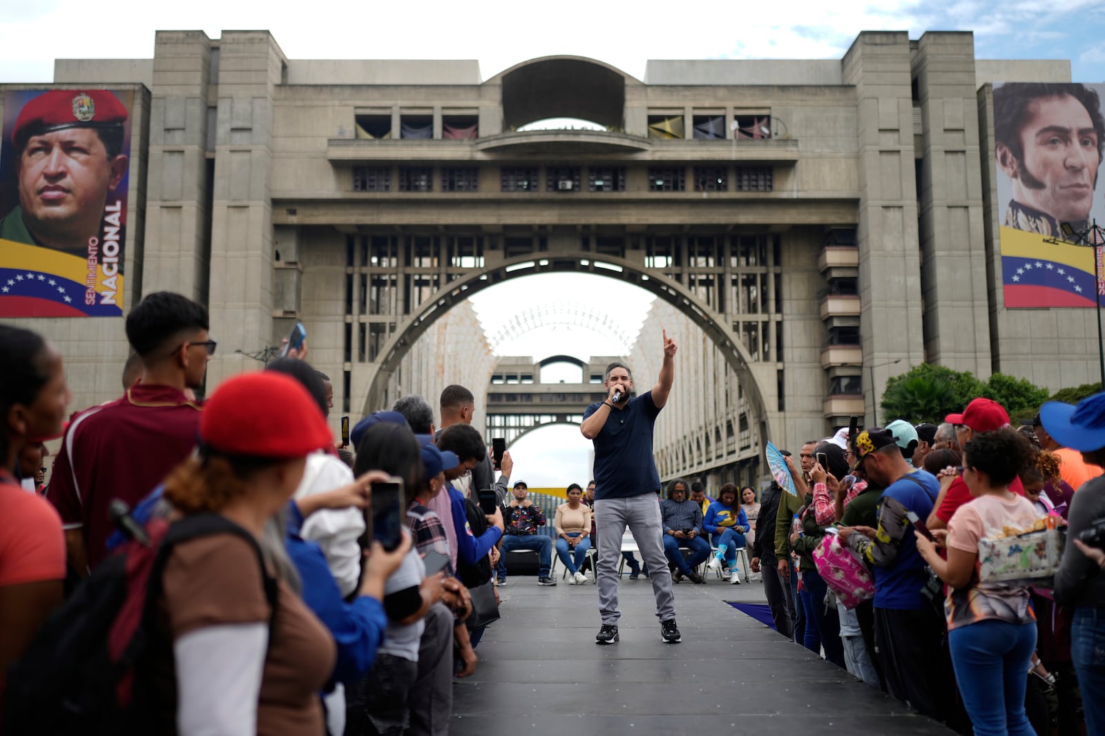 Nicolas Maduro Guerra, son of Venezuelan President Nicolas Maduro, campaigns for National Assembly lawmaker to represent Caracas, with the United Socialist Party of Venezuela (PSUV), in Caracas, Venezuela, Friday, May 9, 2025. (AP Photo/Ariana Cubillos)