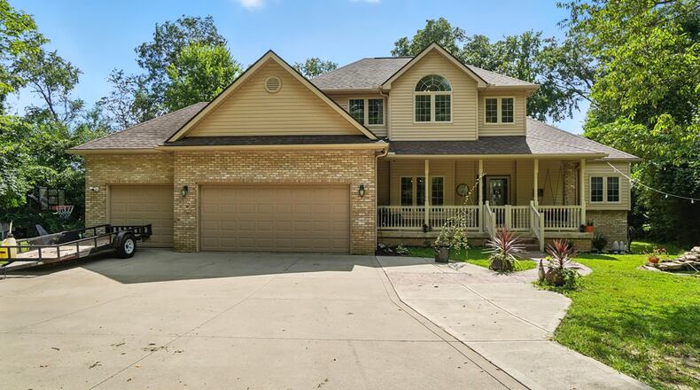 This two story home sits on 2.46 mostly wooded acres in Springfield. It has a covered front porch and a first floor primary suite. CONTRIBUTED