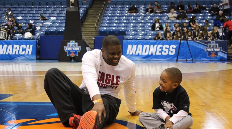 North Carolina Central coach LeVelle Moton and son V.J. (LeVelle Jr.) stretch at UD Arena during Tuesday practice for First Four game Wednesday vs. UC Davis (Photo courtesy, North Carolina Central University Athletics)