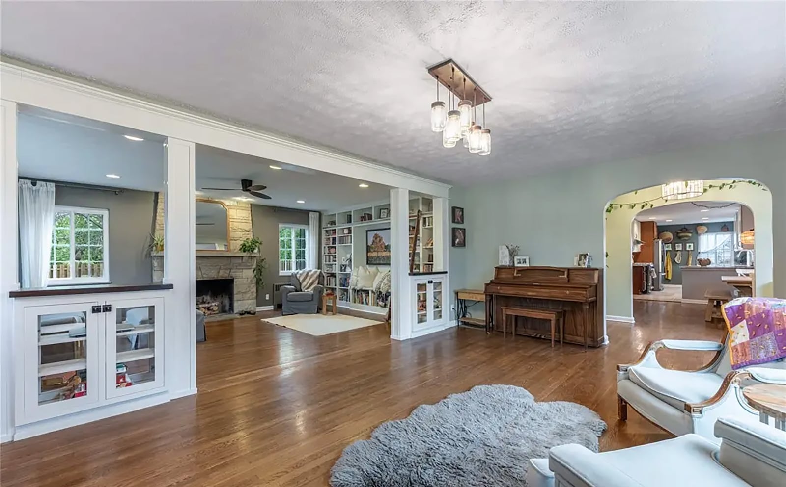 The living room and sitting room/library both have fireplaces, hardwood floors and built ins. CONTRIBUTED