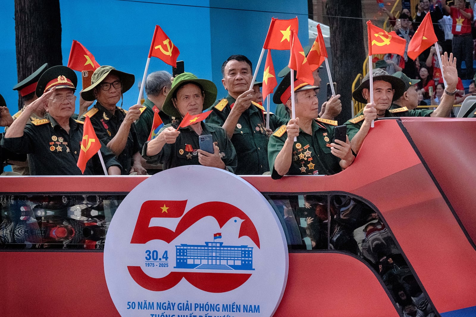 Vietnamese veterans take part in a parade during the 50th anniversary celebration of the end of the Vietnam War on Wednesday, April 30, 2025, in Ho Chi Minh City, Vietnam. (AP Photo/Richard Vogel)