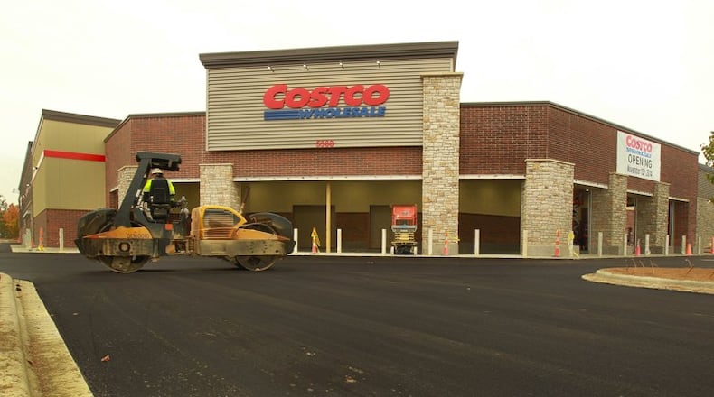 Paving of the parking lot in front of the main entrance to the Costco Wholesale store at the Cornerstone of Centerville project near I-675 and Wilmington Pike in 2014. JIM WITMER/STAFF