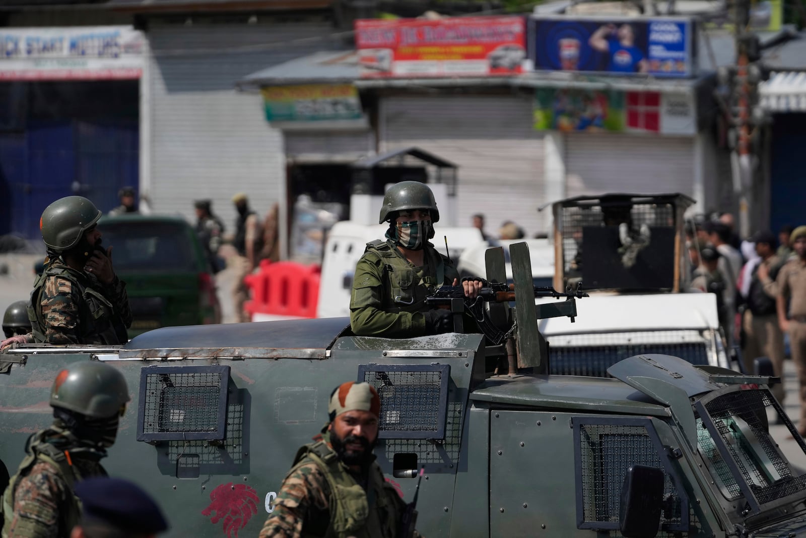 Indian soldiers guard in Srinagar, Indian controlled Kashmir, Wednesday, April. 23, 2025. (AP Photo/Mukhtar Khan)