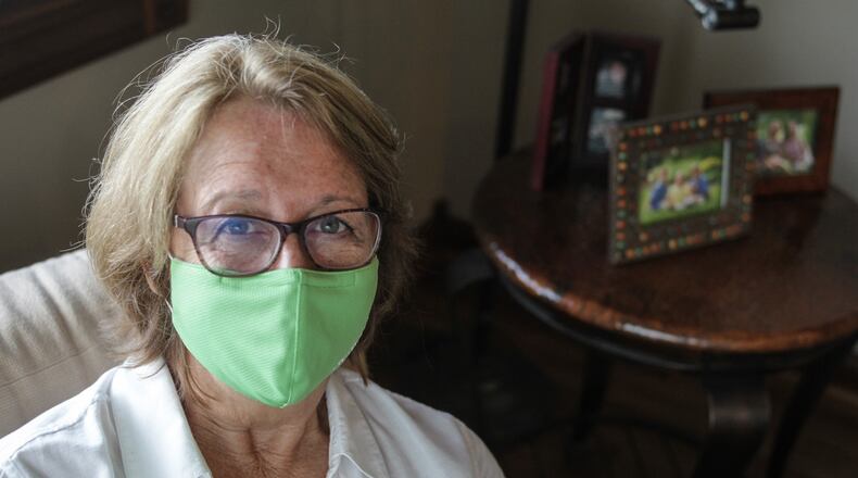 Jennifer Meyer tested positive for COVID-19 and had to self isolate and could not see her mother who was in a nursing home. Her mother recently died and Meyer said she feels her mother died from, "depression and loneliness." JIM NOELKER/STAFF