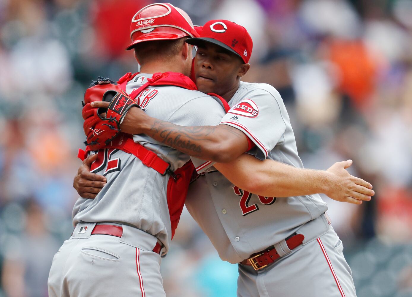 PHOTOS: Reds pile up 13 hits, beat the Rockies