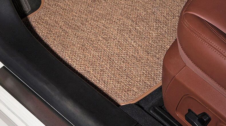 The GG Bailey All-Weather textile car floor mat shown in beige. They offer floor mats in a variety of styles and colors to fit almost any car, both new and classic. Photo from GG Bailey