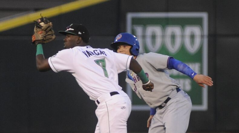 Dragons shortstop Hector Vargas tags out D.J. Wilson of the Cubs, who over-ran second base. The Dragons hosted South Bend at Dayton’s Fifth Third Field in a Class A minor-league baseball game on Monday, July 10, 2017. MARC PENDLETON / STAFF