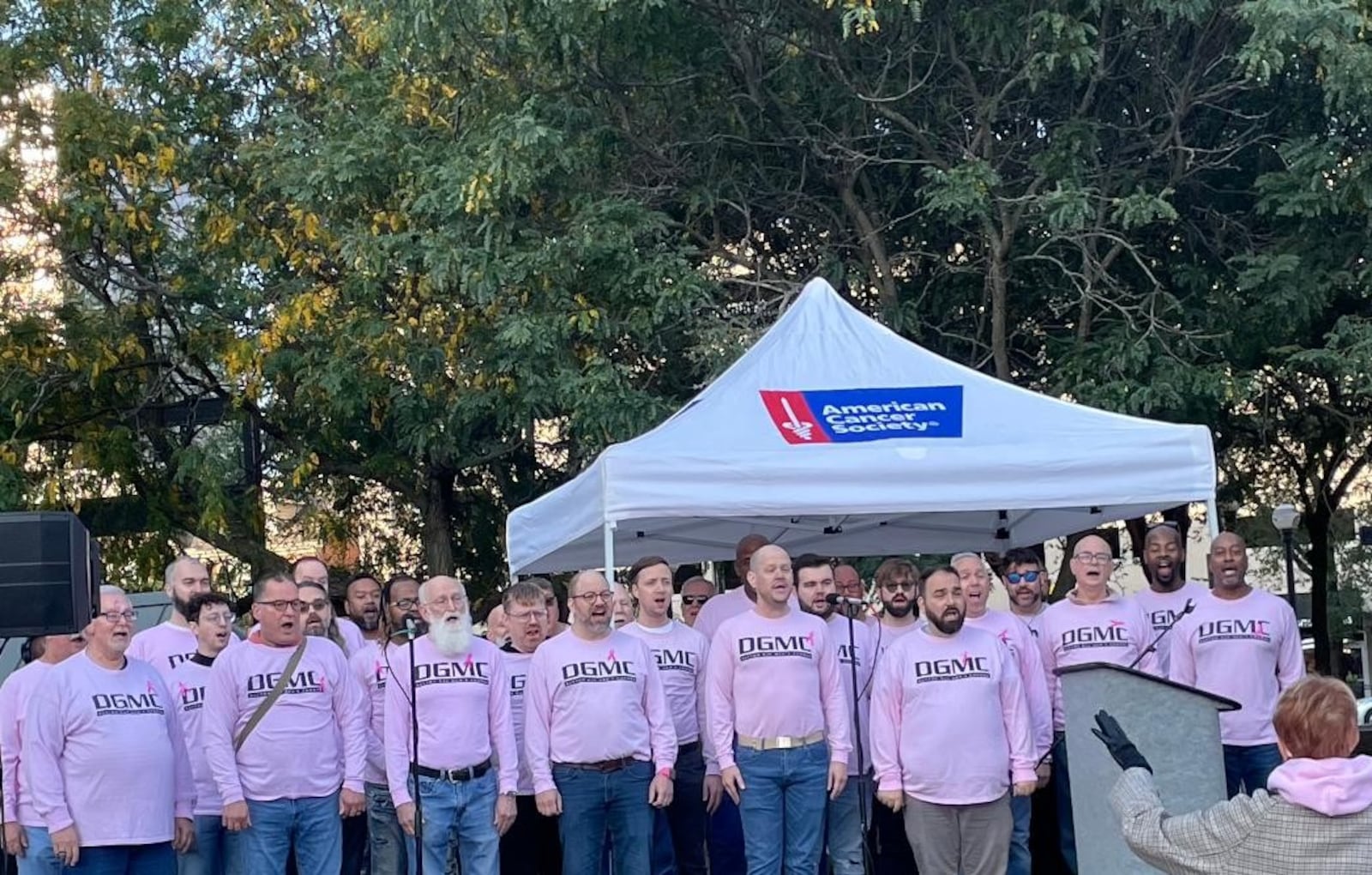 The Dayton Gay Men's Chorus under the direction of Kathy Clark perform at the 28th Making Strides Against Breast Cancer of Dayton event Oct. 11 at Day Air Ballpark. PHOTO BY RUSSELL FLORENCE JR.