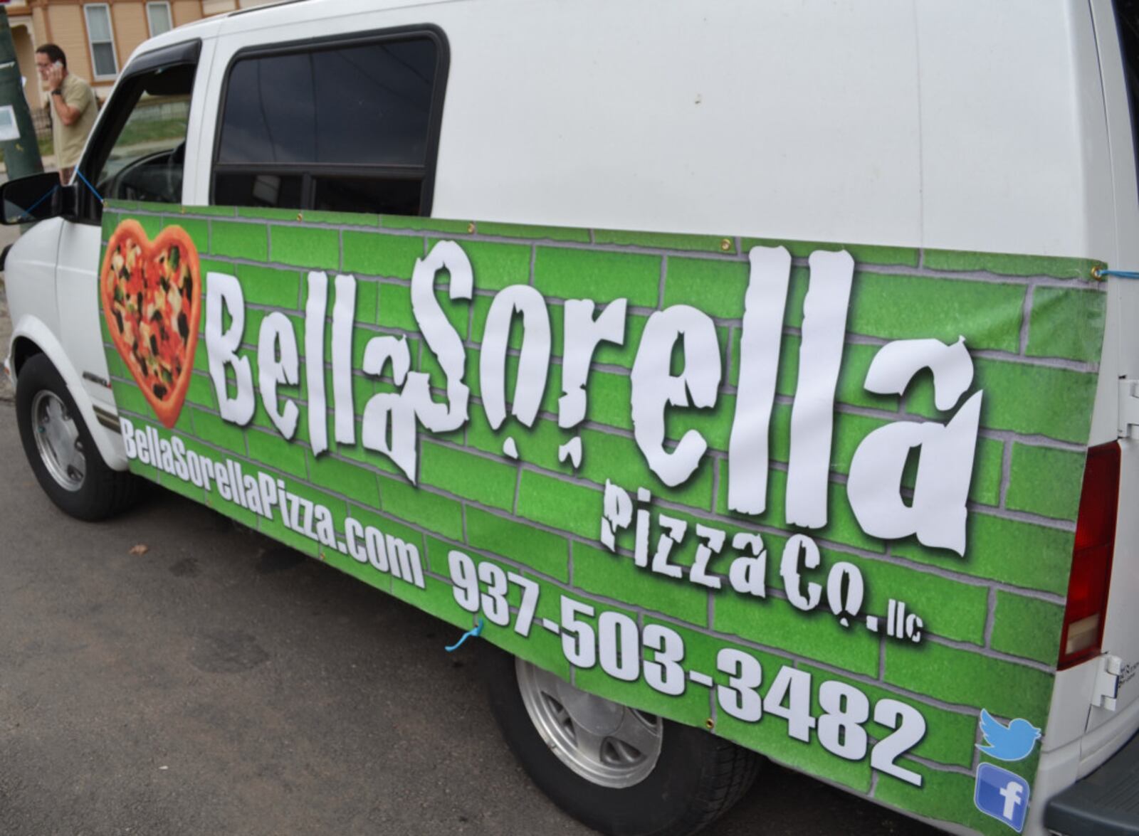 Dayton’s newest food truck is a mobile food van that tows a wood-fired brick pizza oven behind it. Photo by Mark Fisher