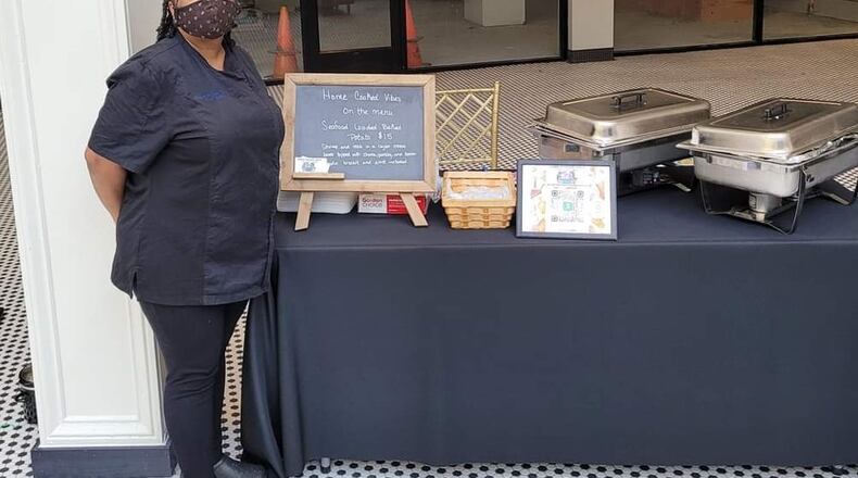 Syrita Nuttall, founder and executive chef of Home Cooked Vibes in Fairborn, at a catering event in 2021. CONTRIBUTED