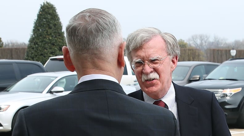 U.S. Secretary of Defense Jim Mattis (L), greets incoming National Security Advisor John Bolton upon his arrival for a meeting at the Pentagon, on March 29, 2018 in Arlington, Virginia. (Photo by Mark Wilson/Getty Images)