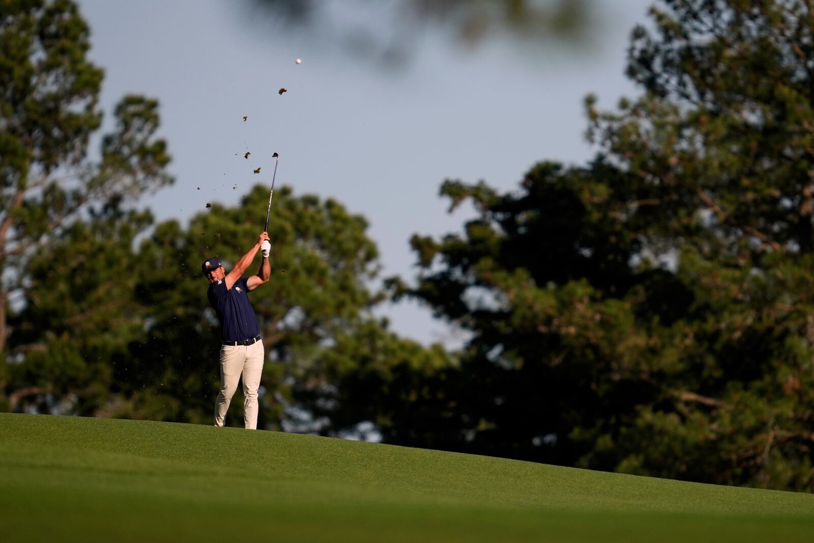 Bryson DeChambeau hits from the fairway on the 15th hole during the final round at the Masters golf tournament, Sunday, April 13, 2025, in Augusta, Ga. (AP Photo/Ashley Landis)