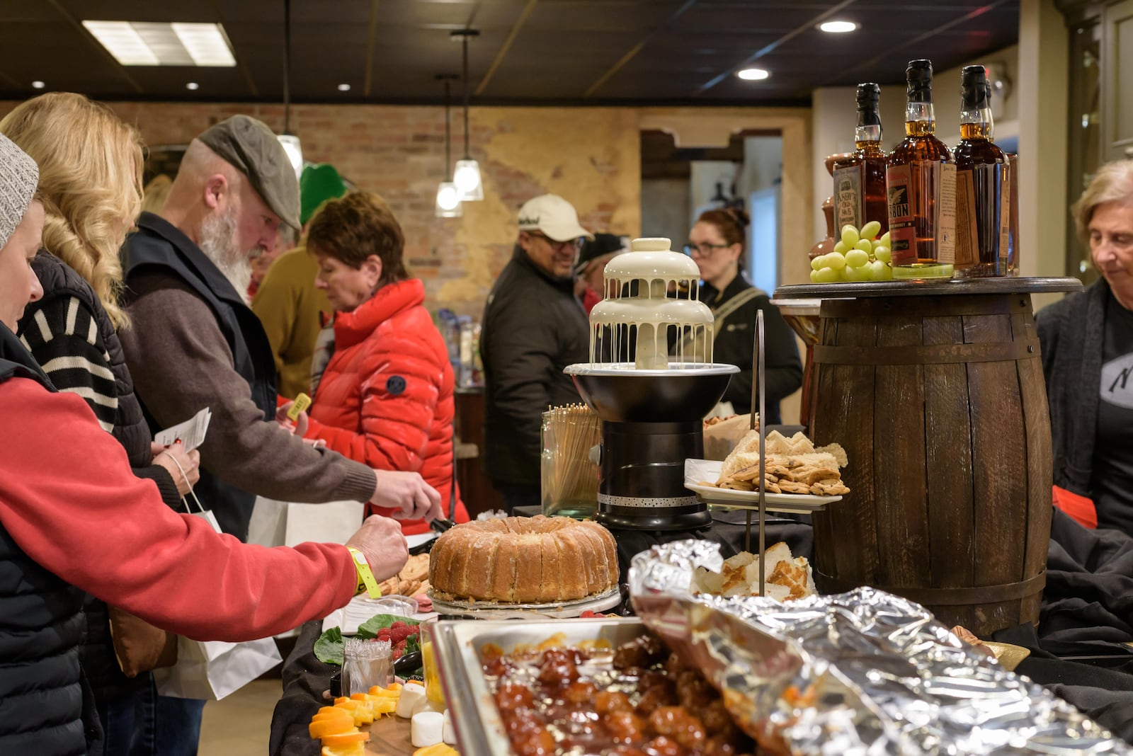 The Downtown Tipp City Partnership hosted its signature Chocolate and Bourbon Event on Friday, Feb. 7, 2025. TOM GILLIAM / CONTRIBUTING PHOTOGRAPHER