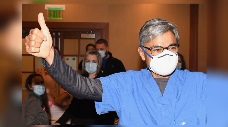 Dr. Hemant Shah, a Kettering Health Network critical care physician, was the first in the KHN system to receive the first of the two-dose Moderna COVID-19 vaccine Wednesday, Dec. 23, 2020. Contributed