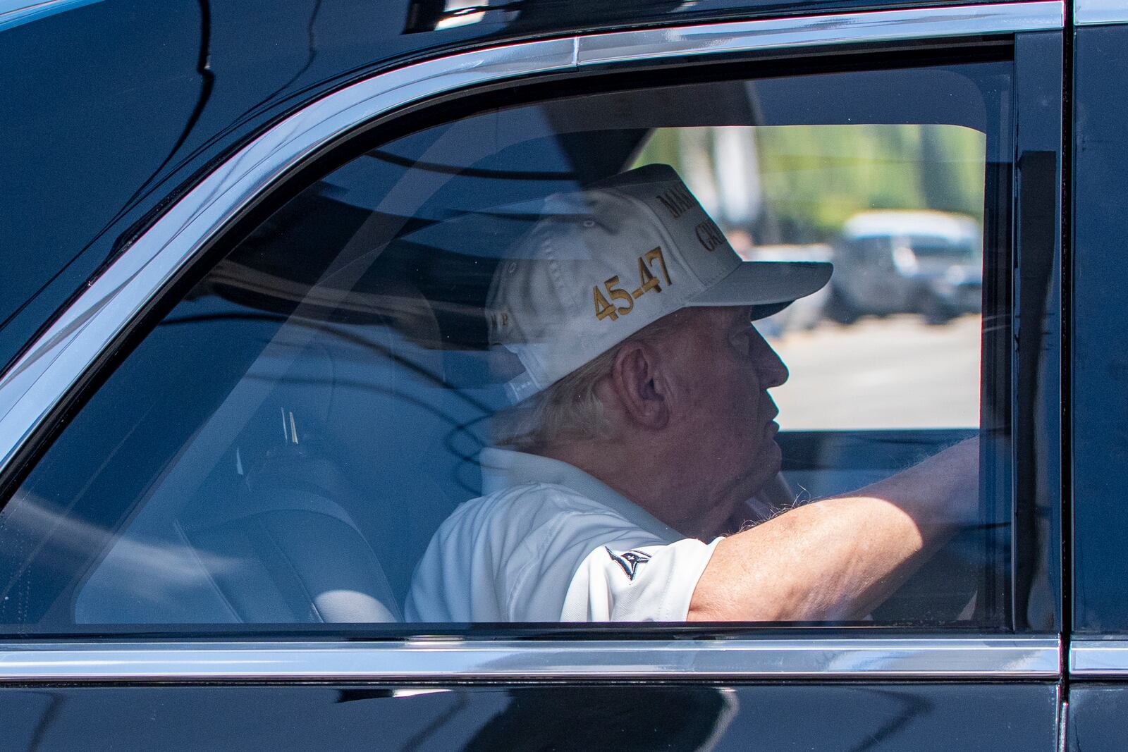 President Donald Trump returns to his Mar-a-Lago club from Trump National Golf Club, Sunday, April 6, 2025, in West Palm Beach, Fla. (AP Photo/Alex Brandon)