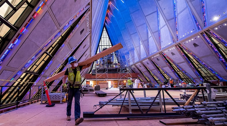 Crews erect scaffolding around the interior of the U.S. Air Force Academy Cadet Chapel on May 11 in Colorado Springs, Colo. The chapel closed in early September 2019 to allow for necessary repairs and is estimated to be completed in 2024. (U.S. Air Force photo/Trevor Cokley)