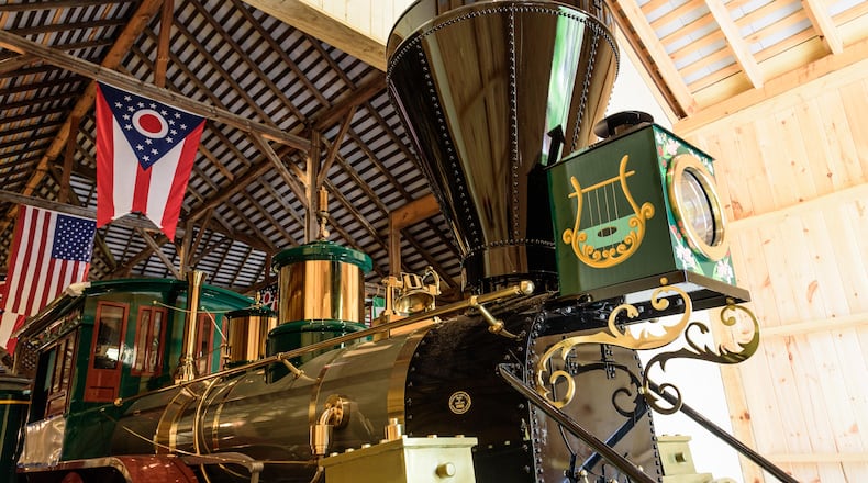 The new passenger train at Carillon Historical Park is a full-size replica of the “Cincinnati,” the first locomotive to pull a passenger train into Dayton in 1851 on the Cincinnati, Hamilton & Dayton Railroad. TOM GILLIAM / CONTRIBUTING PHOTOGRAPHER