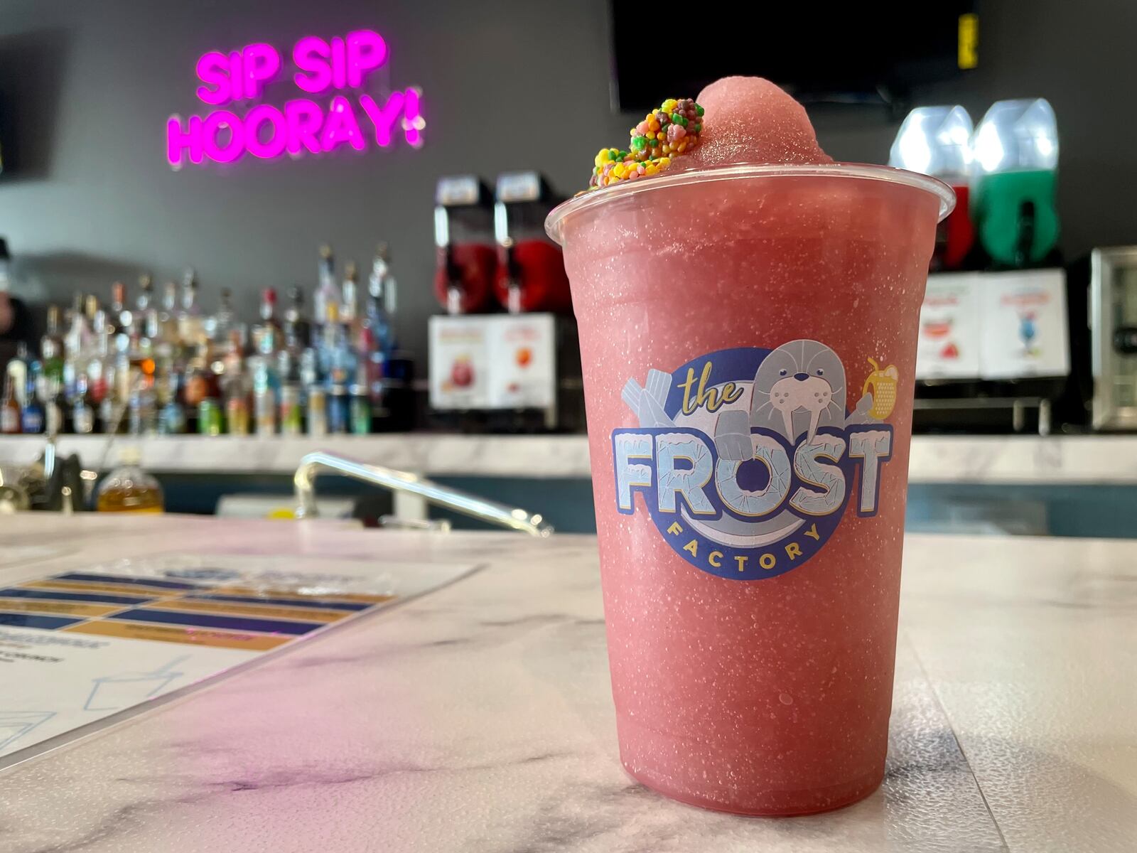 The Frost Factory, a boutique bar with boozy slushies, cocktails, shots and more, is now open at Austin Landing. NATALIE JONES/STAFF