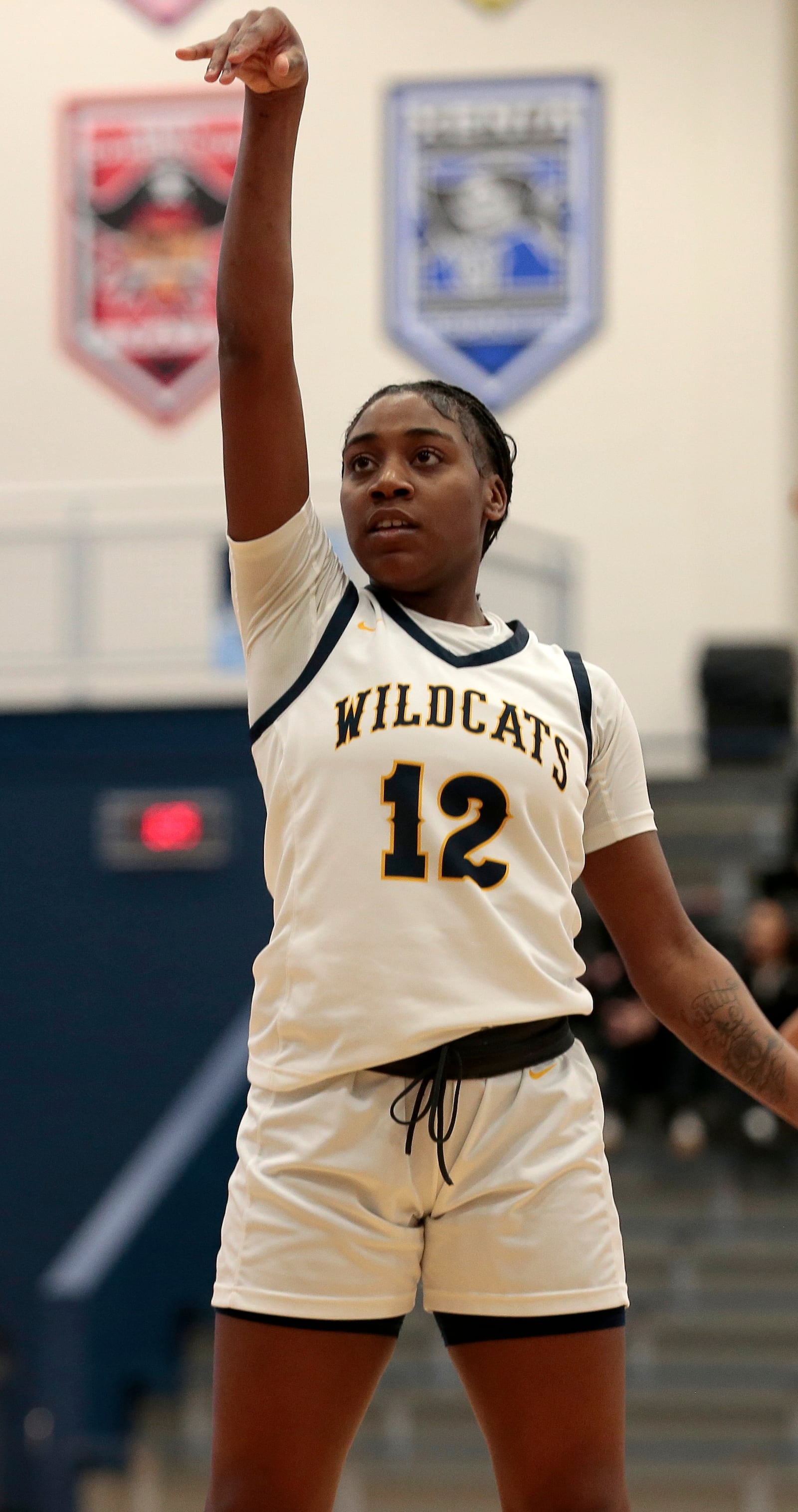 Springfield senior Day'veonna Boynton poses after releasing a free throw attempt. Fairmont defeated Springfield 65-32 in the Division I district semifinals on Monday, Feb. 23, 2026, in Fairborn. STEVEN WRIGHT / STAFF