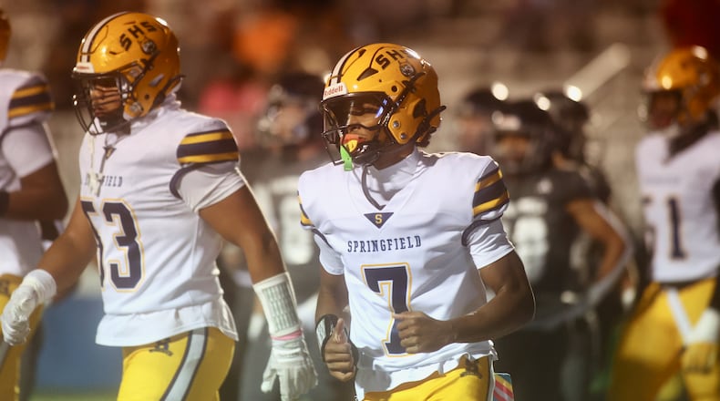 Springfield's Christopher Wallace returns to the bench after running for a touchdown in the first half against Fairmont on Friday, Oct. 17, 2025, at Roush Stadium in Kettering. David Jablonski/Staff