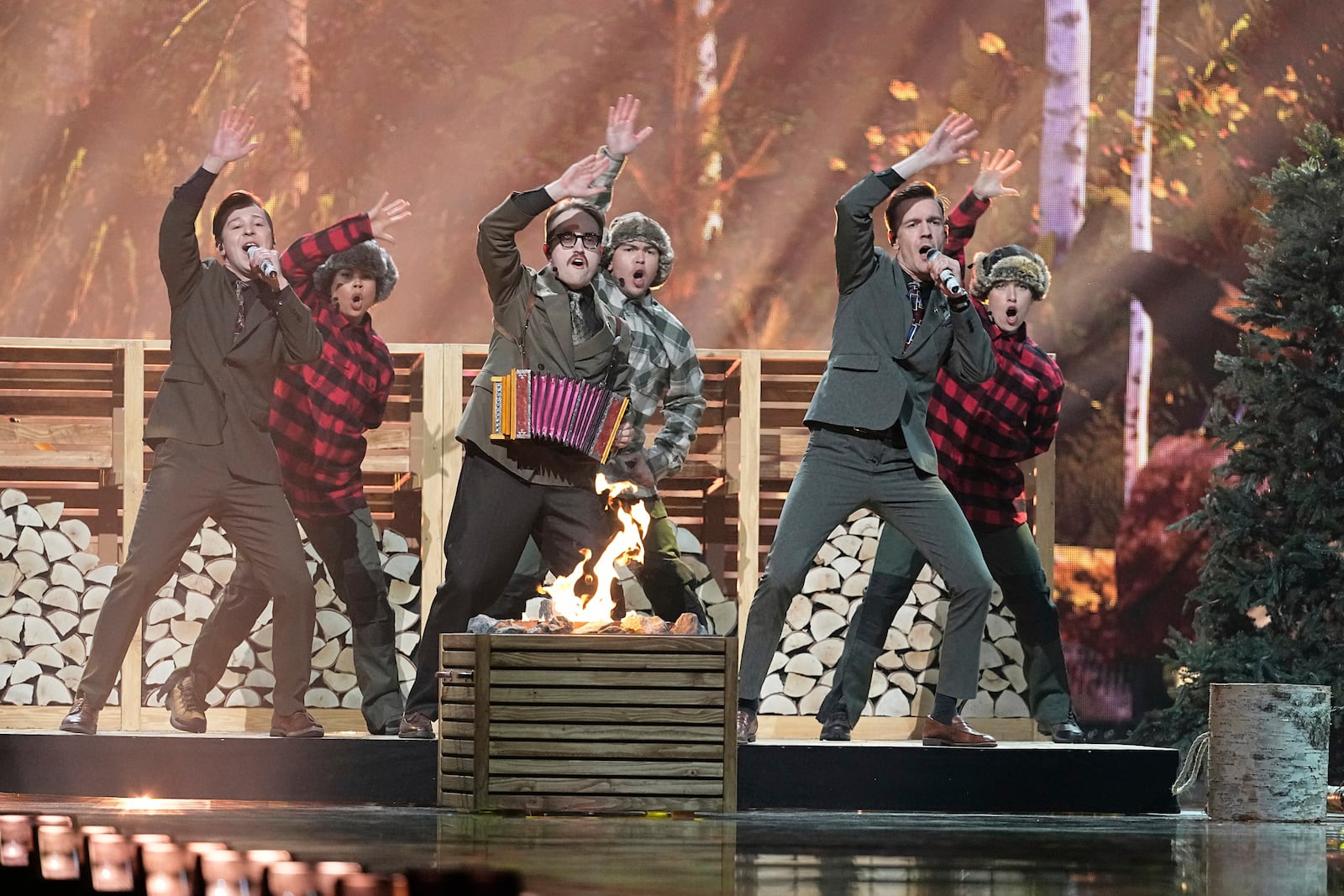 KAJ from Sweden performs the song "Bara Bada Bastu" during the dress rehearsal for the Grand Final of the 69th Eurovision Song Contest, in Basel, Switzerland, Friday, May 16 2025. (AP Photo/Martin Meissner)