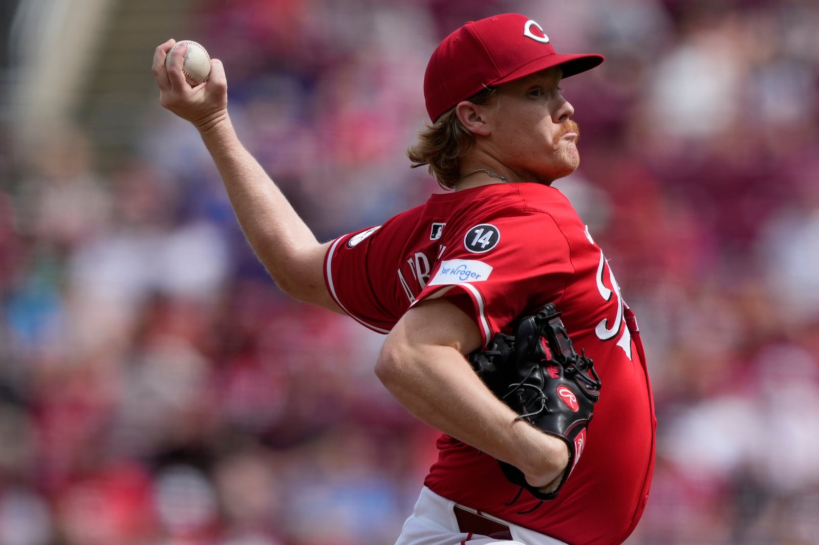 Cincinnati Reds pitcher Andrew Abbott throws in the first inning of a baseball game against the Chicago Cubs, Saturday, May 24, 2025, in Cincinnati. (AP Photo/Carolyn Kaster)