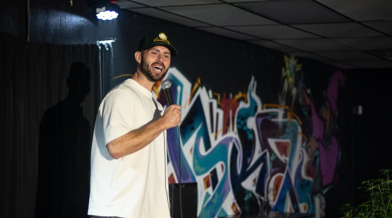 Comedian Henry Allen performs at the Jokes & Tokes Comedy Club. Photo by Eric Boso