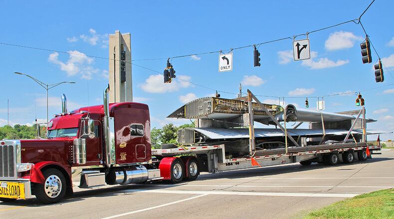 A truck carrying the wings of a C-130 Hercules arrives at the University of Dayton Research Institute headquarters May 15. Once all of the parts have arrived, and are reassembled, researchers from UDRI will perform work in collaboration with the Air Force Life Cycle Management Center’s Product Support Engineering Division and the AFLCMC C-130 Program Office. (Contributed photo)