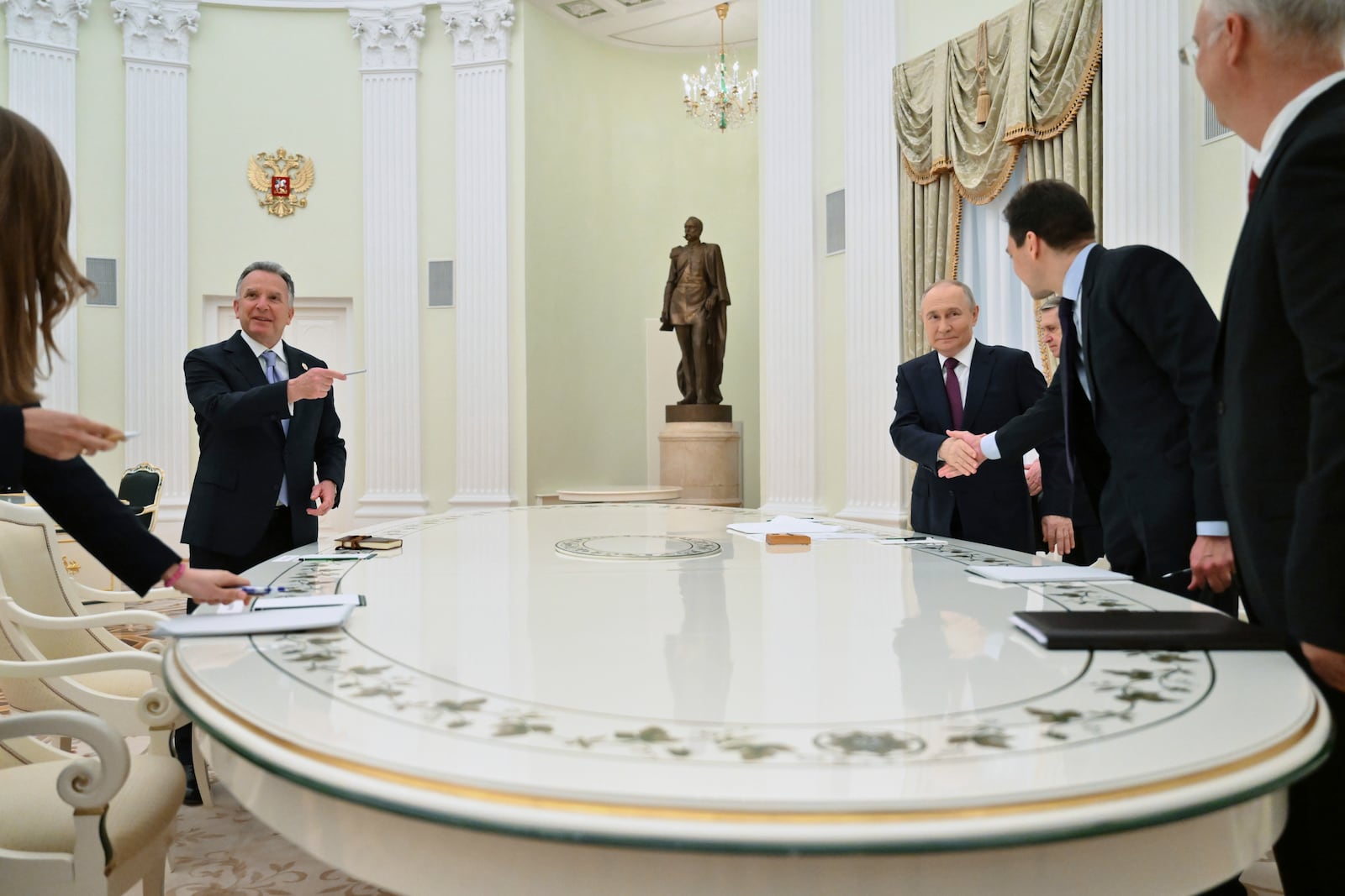 Russian President Vladimir Putin, third right, and U.S. President Donald Trump's special envoy Steve Witkoff, left, arrive to attend their talks at the Kremlin in Moscow, Russia, Friday, April 25, 2025. (Kristina Kormilitsyna, Sputnik, Kremlin Pool Photo via AP)