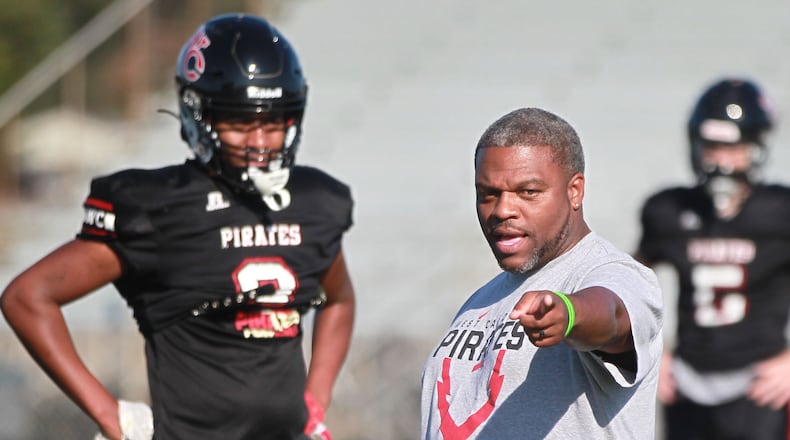 West Carrollton High School football head coach Dion Black instructs the Pirates during practice on Wednesday, Oct. 9, 2019. Black will coach the South squad in Friday's MVFCA All-Star Game. FILE PHOTO