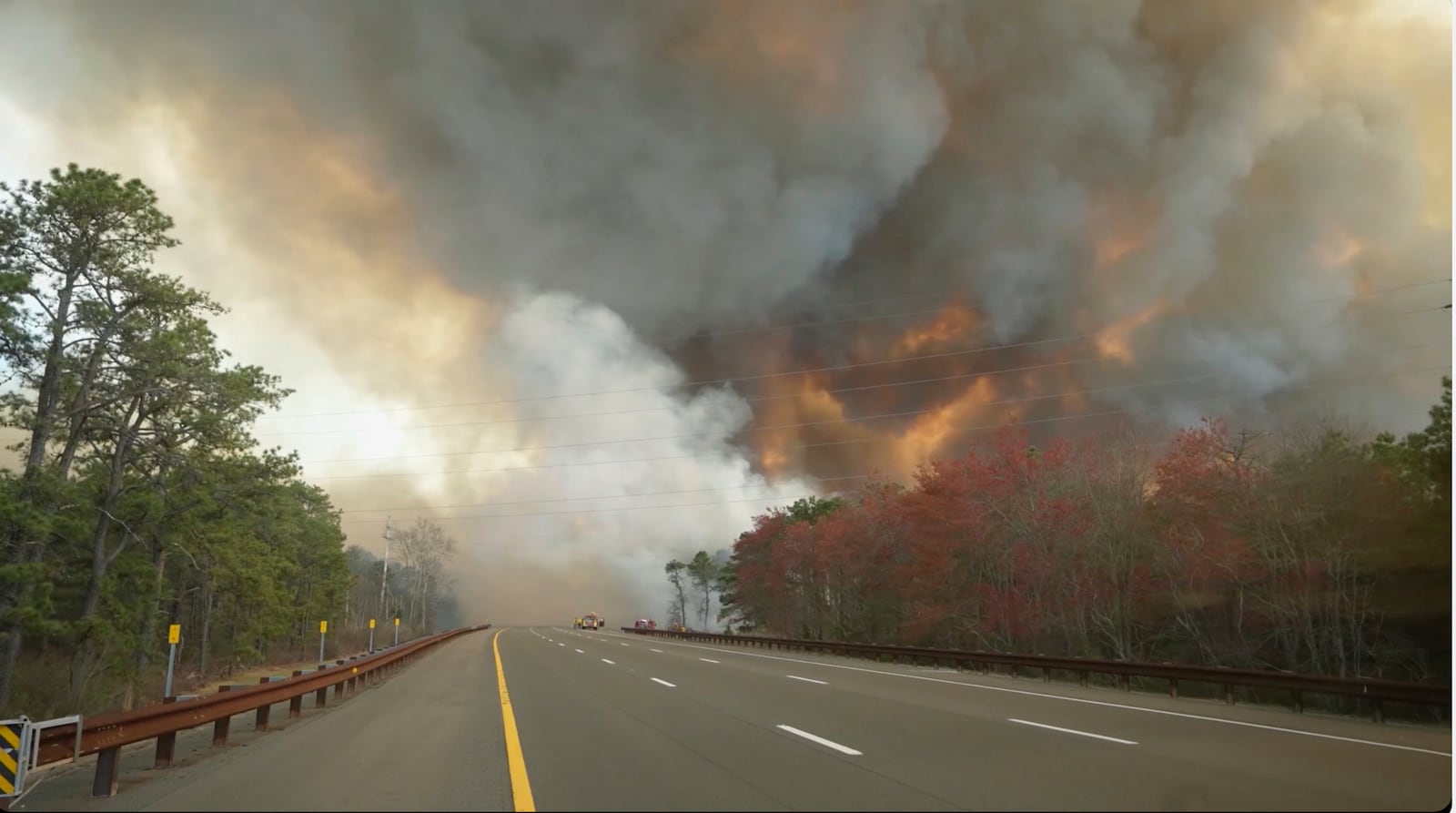 Smoke fills the sky from a wildfire in Lacey Townships, N.J. on Tuesday, April 22, 2025. (New Jersey Department of Environmental Protection via AP)