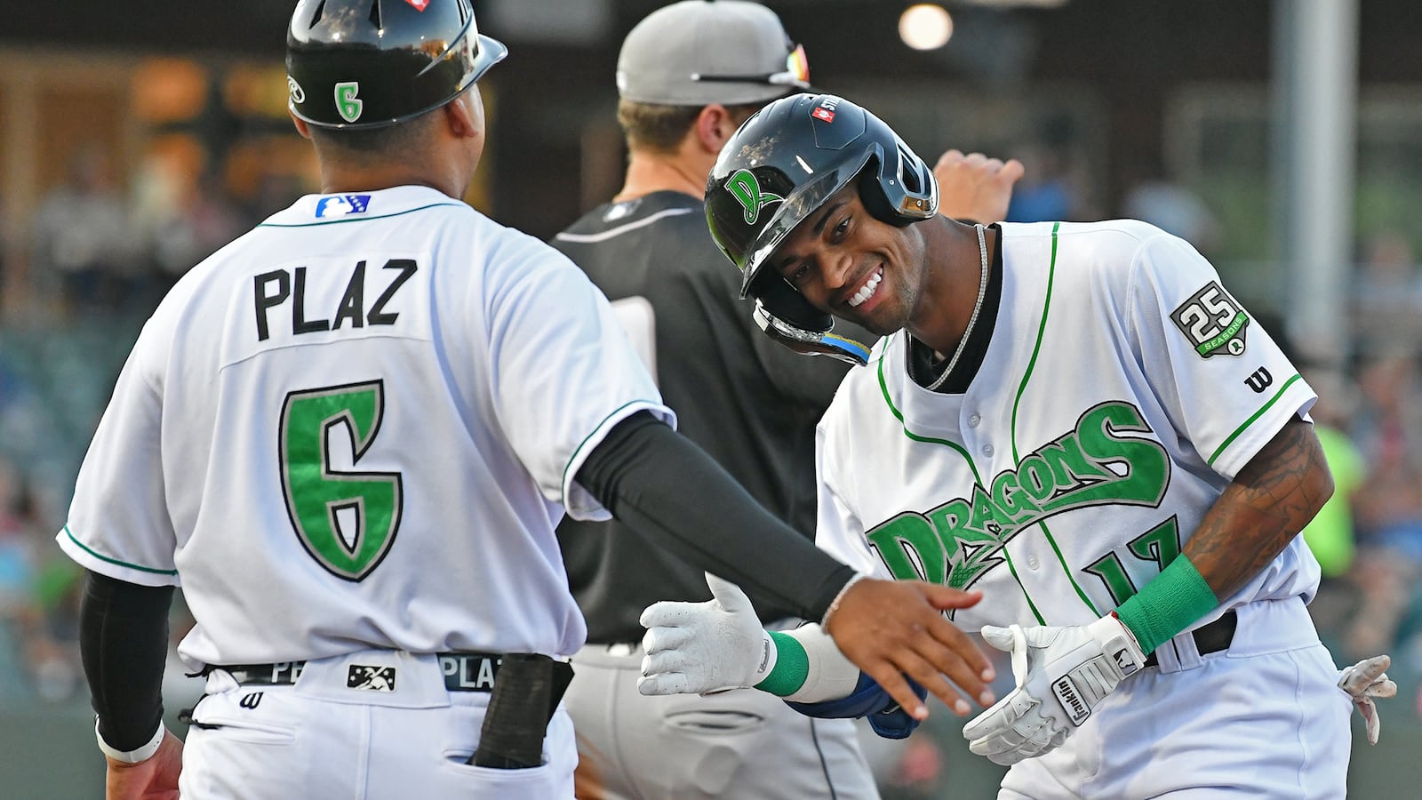 Alexander Vargas celebrates a two-out single in the second inning that led to him scoring for a 2-0 lead Tuesday night at Day Air Ballpark. JEFF GILBERT/CONTRIBUTED