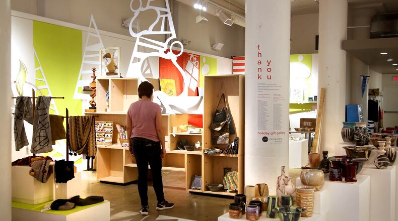The Contemporary Dayton has transformed its gallery into the Annual Holiday Gift Gallery. More than 70 local and regional artists have created original, fine art pieces perfect for holiday gifts. LISA POWELL / STAFF