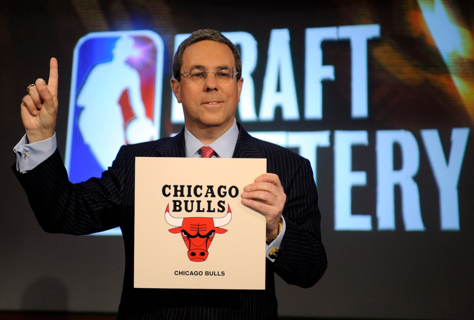 FILE - Chicago Bulls executive vice-president of business operations Steve Schanwald poses for photographers after winning the NBA draft lottery, giving the Bulls the number one pick in the upcoming draft, Tuesday, May 20, 2008, in Secaucus, N.J. (AP Photo/Bill Kostroun, File)