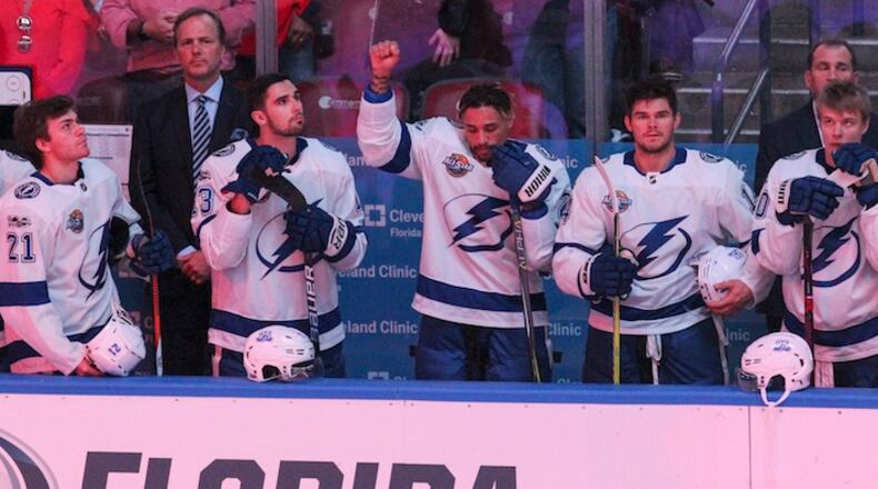 The Tampa Bay Lightning's J.T. Brown protests during the national anthem before the start of a game against the Florida Panthers at the BB&T Center in Sunrise, Fla., on October 7, 2017. (Matias J. Ocner/Miami Herald/TNS)