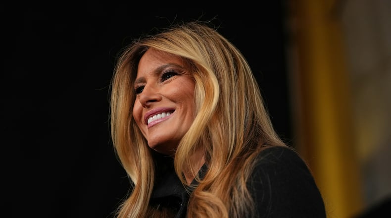 First lady Melania Trump arrives for the premiere of her movie "Melania" at The John F. Kennedy Memorial Center For The Performing Arts, Thursday, Jan. 29, 2026, in Washington. (AP Photo/Allison Robbert)