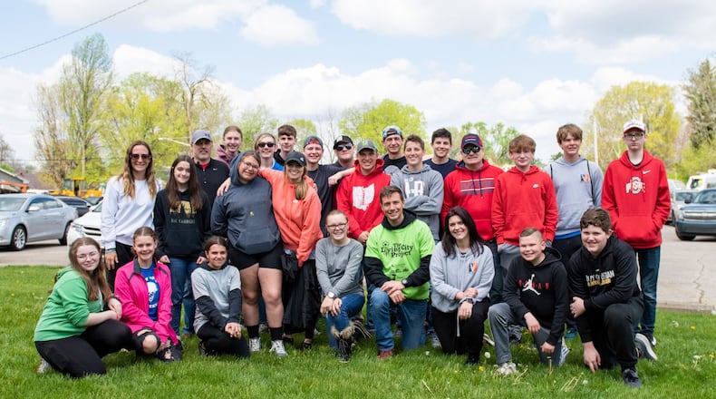 Volunteers of the Living City Project, a citywide cleanup initiative. This year’s cleanup will be held Saturday, April 20. PHOTO/JUSTIN SPIVEY