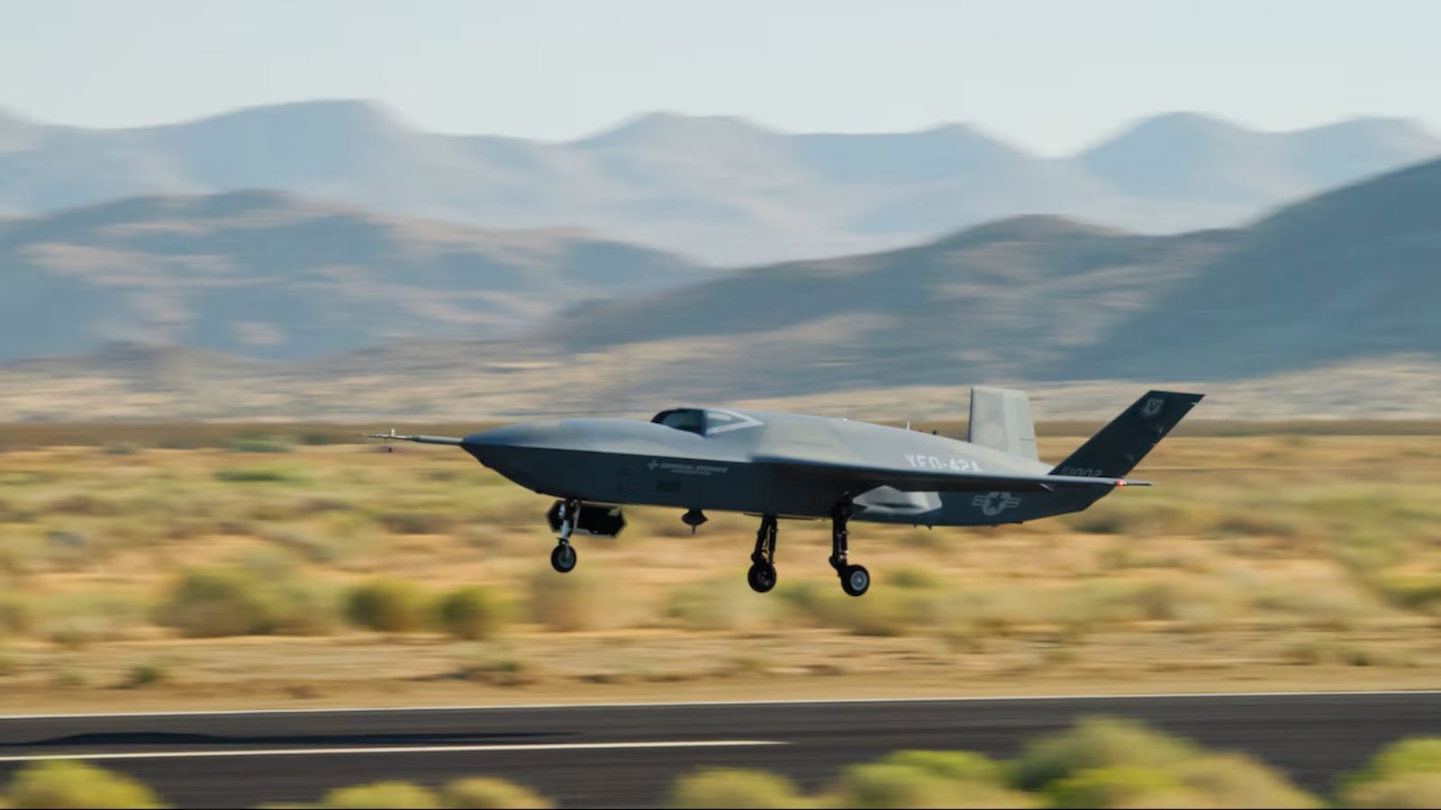 A YFQ-42A Collaborative Combat Aircraft takes off during flight testing at a California test location. The aircraft was developed in partnership with General Atomics as part of the Air Force’s effort to accelerate delivery of affordable, semi-autonomous aircraft. (Courtesy photo)