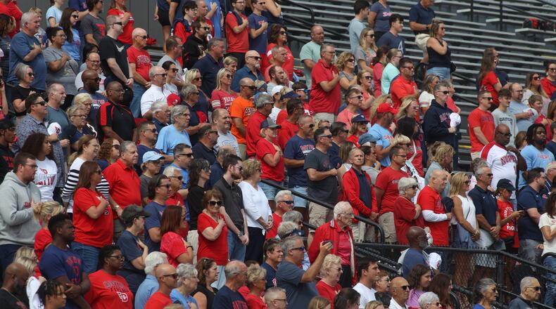 Dayton fans stand for the national anthem before a game against Central State on Saturday, Sept. 9, 2023, at Welcome Stadium. David Jablonski/Staff