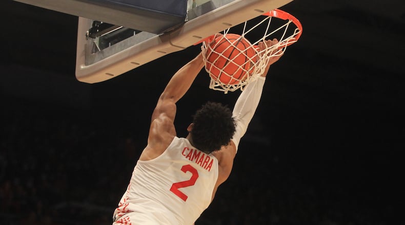 Dayton's Toumani Camara dunks against Cedarville in the first half on Monday, Nov. 1, 2021, at UD Arena. David Jablonski/Staff