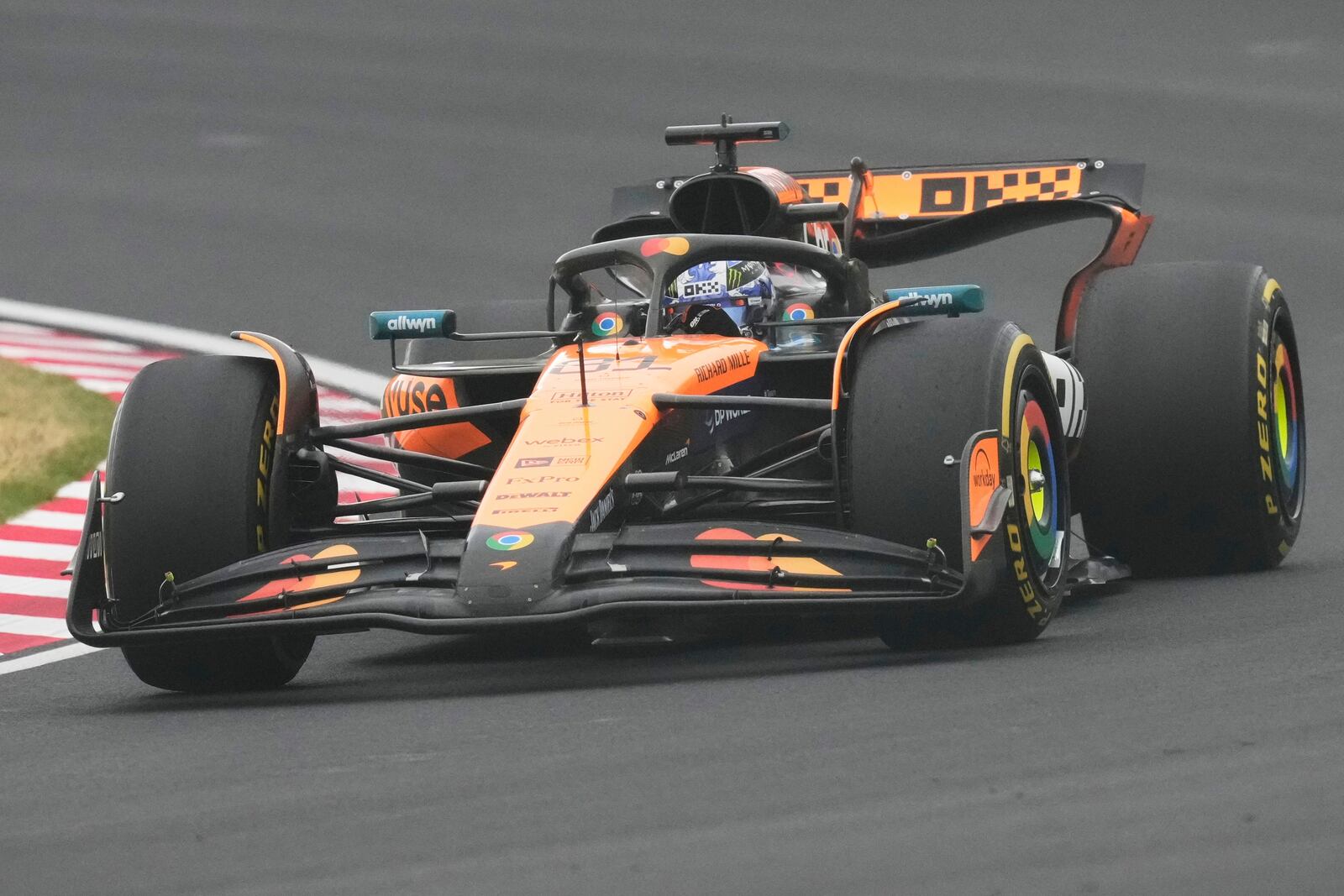 McLaren driver Oscar Piastri of Australia steers his car during the Japanese Formula One Grand Prix at the Suzuka Circuit in Suzuka, central Japan, Sunday, April 6, 2025. (AP Photo/Hiro Komae)