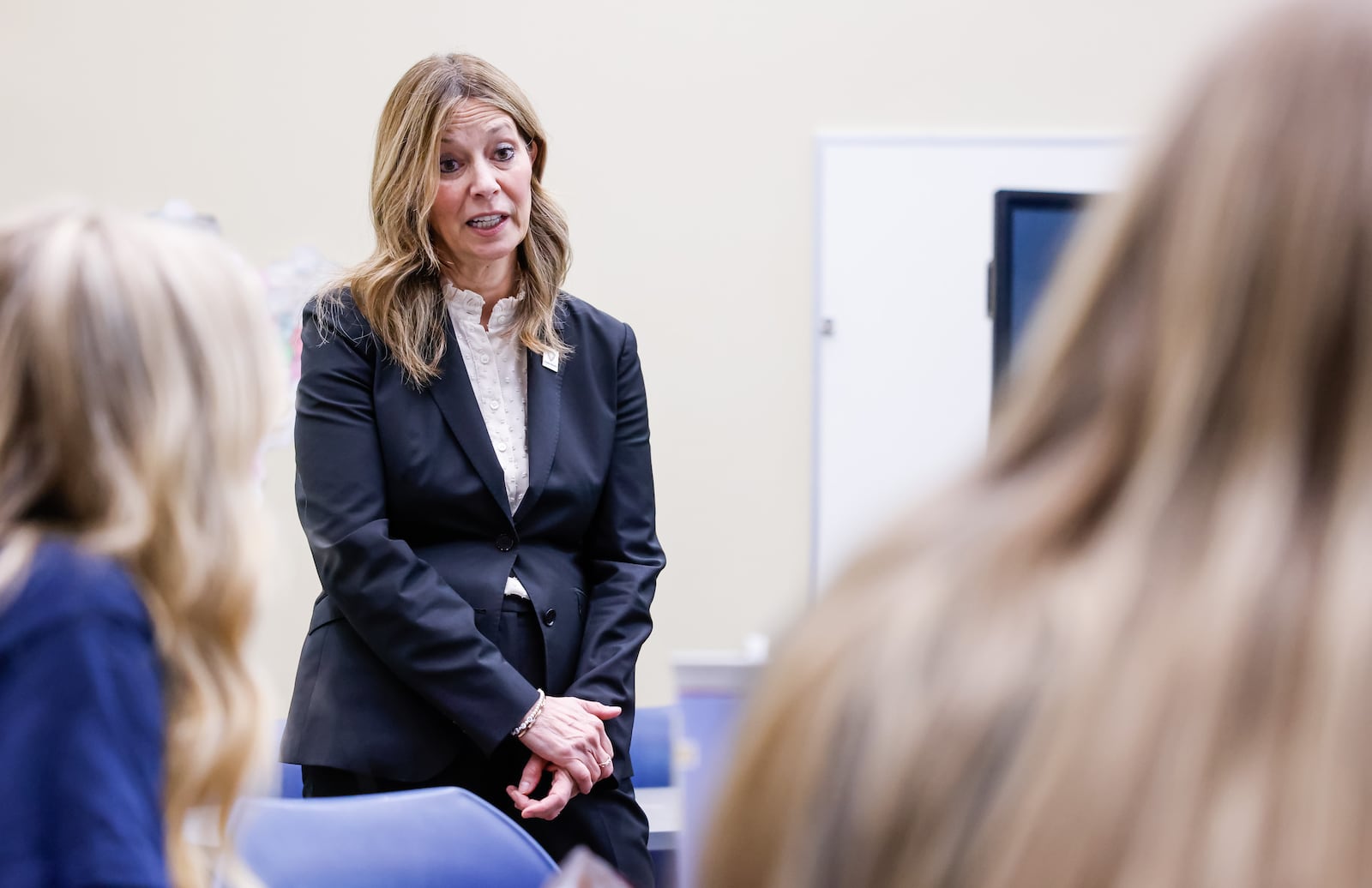 Democrat Ohio gubernatorial candidate Amy Acton talks with Monroe High School students Wednesday, Jan. 14, 2026 in Monroe. She visited classrooms and spoke with students, teachers and leadership during the tour. NICK GRAHAM/STAFF