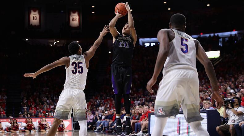 TUCSON, AZ - JANUARY 29: Markelle Fultz #20 of the Washington Huskies attempts a shot over Allonzo Trier #35 of the Arizona Wildcats during the second half of the college basketball game at McKale Center on January 29, 2017 in Tucson, Arizona. The Wildcats defeated the Huskies 77-66. (Photo by Christian Petersen/Getty Images)