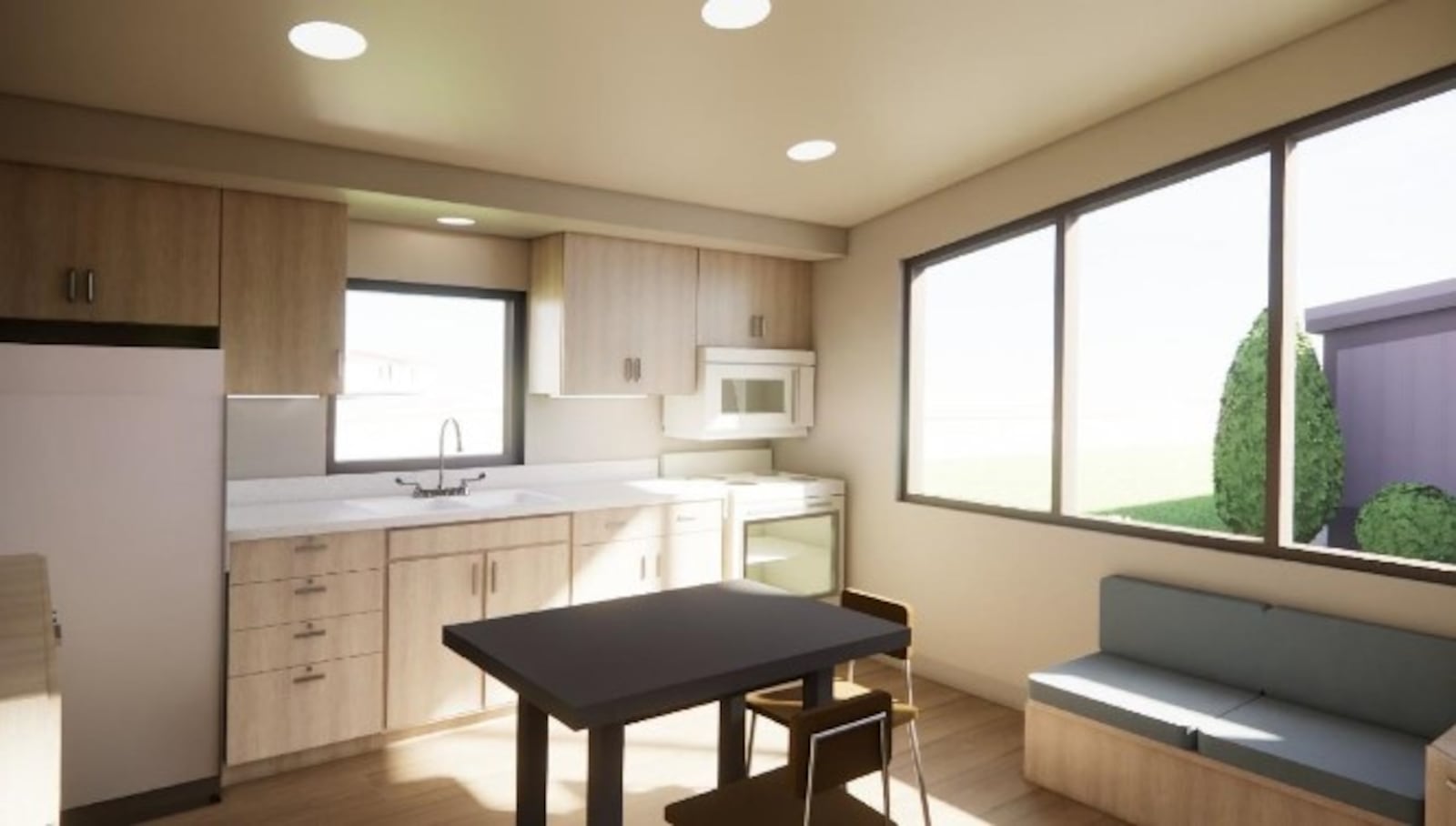 A conceptual rendering of the inside a tiny home in the proposed Beacon Place Village  in northeast Dayton. The housing project calls for 40 units, which would have built-in cabinets and appliances. CONTRIBUTED