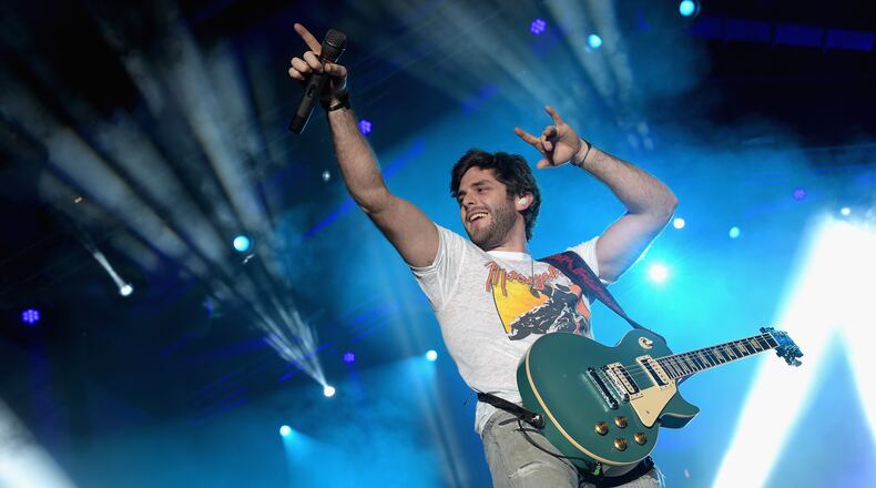 GLENDALE, AZ - JANUARY 28: Singer Thomas Rhett performs onstage at the HGTV Lodge during Day 1 of the DirecTV Super Fan Festival at Pendergast Family Farm on January 28, 2015 in Glendale, Arizona. (Photo by Rick Diamond/Getty Images for DirecTV)